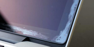 Solution écran macbook traces grises garantie